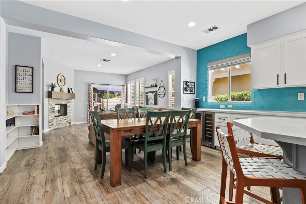 19735 Edmonds Place Saugus, CA 91350 - Photo 5 of 34 a dining room with furniture and wooden floor