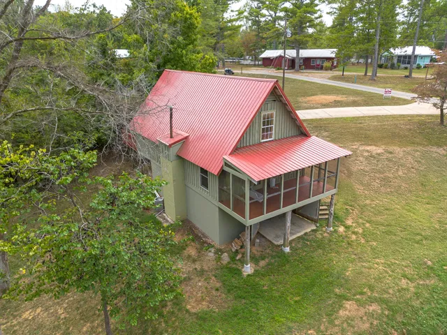 a view of lake with green space