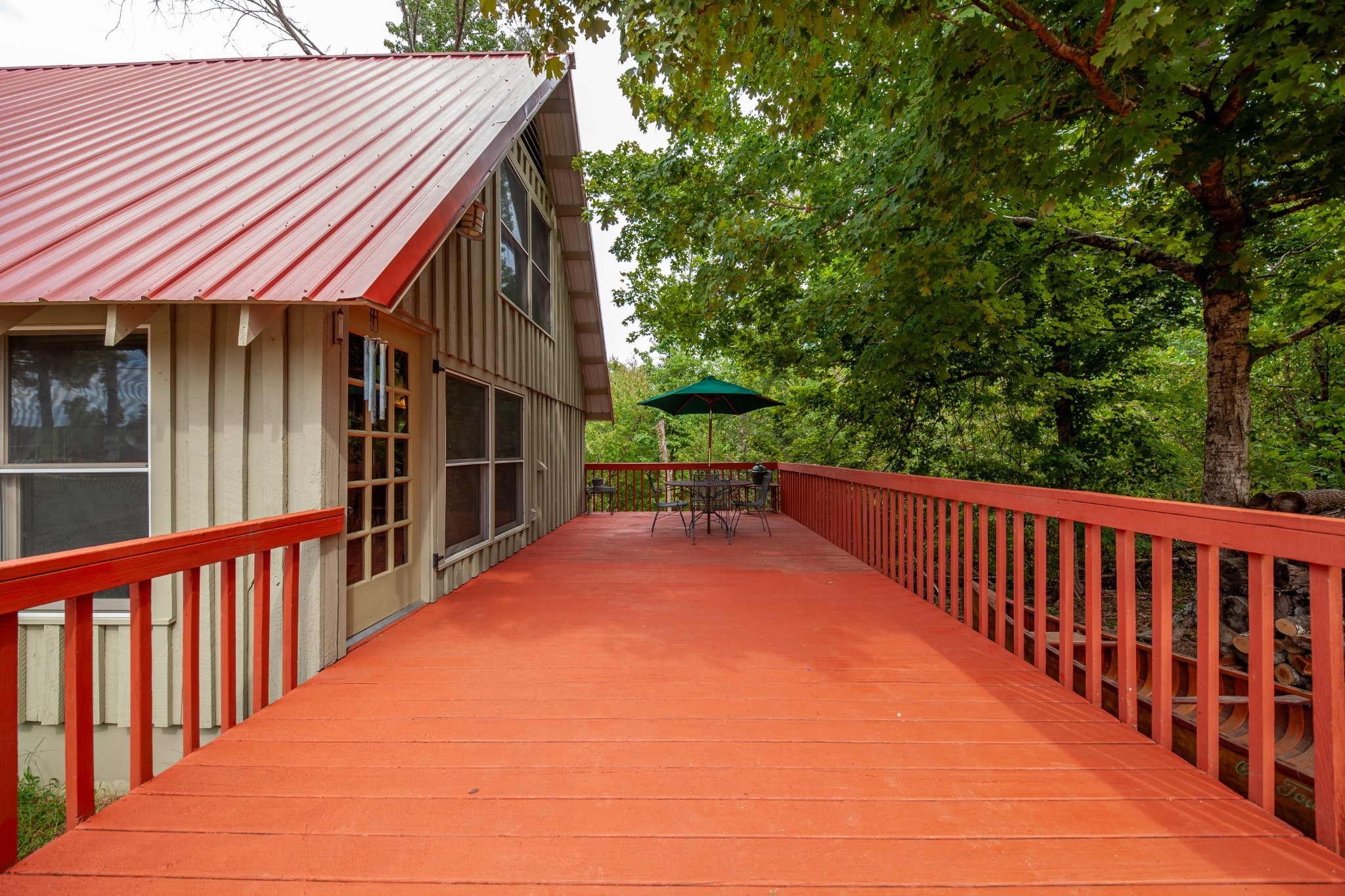 4428 Deer Creek Road Linden, TN 37096 - Photo 18 of 70 a view of a house with backyard and deck