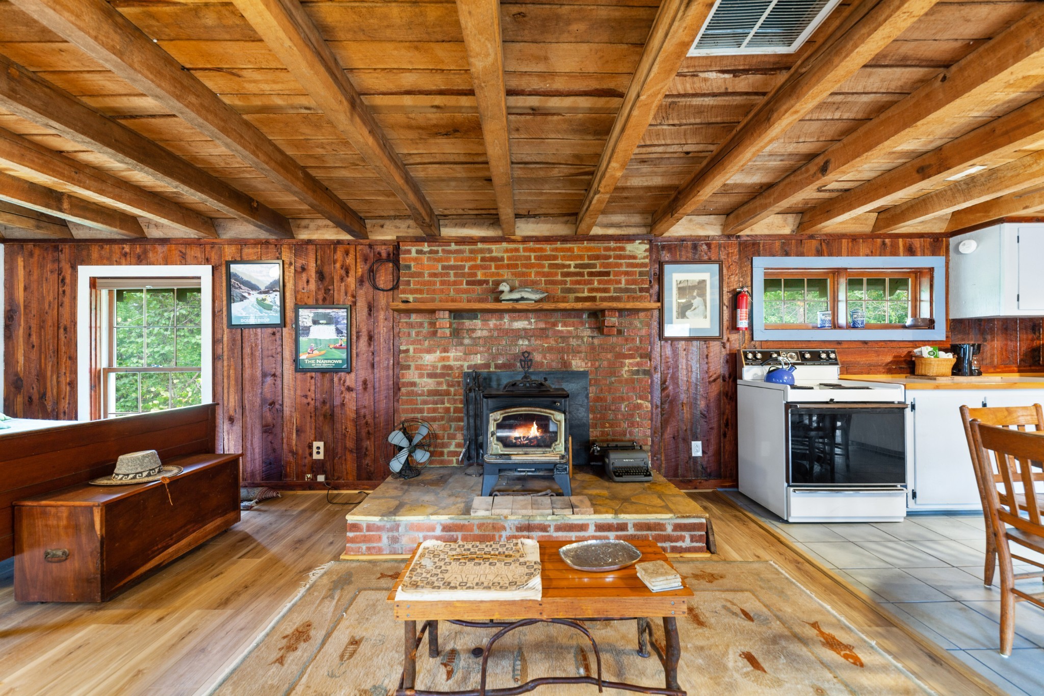 4428 Deer Creek Road Linden, TN 37096 - Photo 29 of 70 a living room with furniture flat screen tv and a fireplace