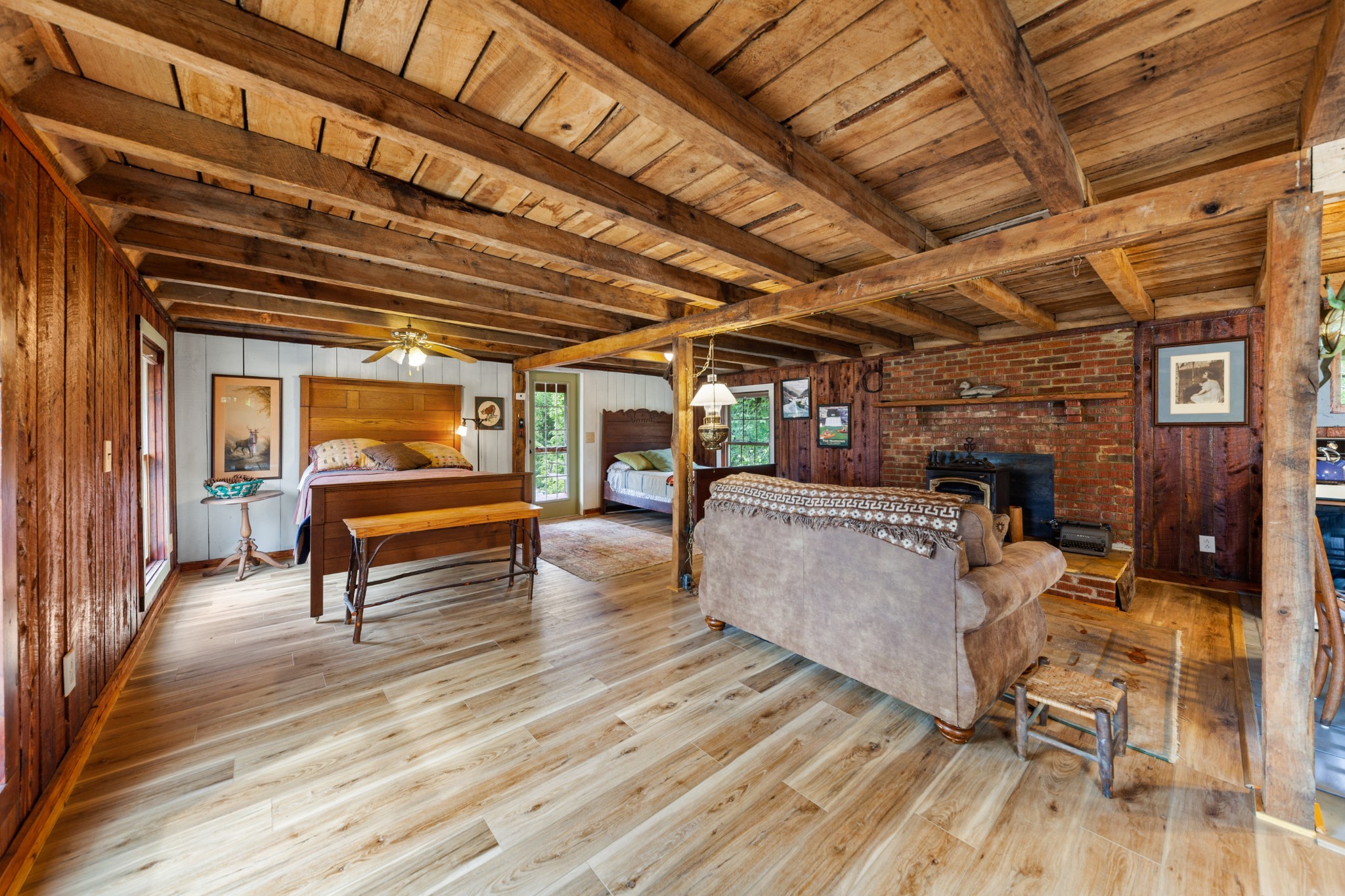 4428 Deer Creek Road Linden, TN 37096 - Photo 39 of 70 a view of a patio with table and chairs with wooden floor