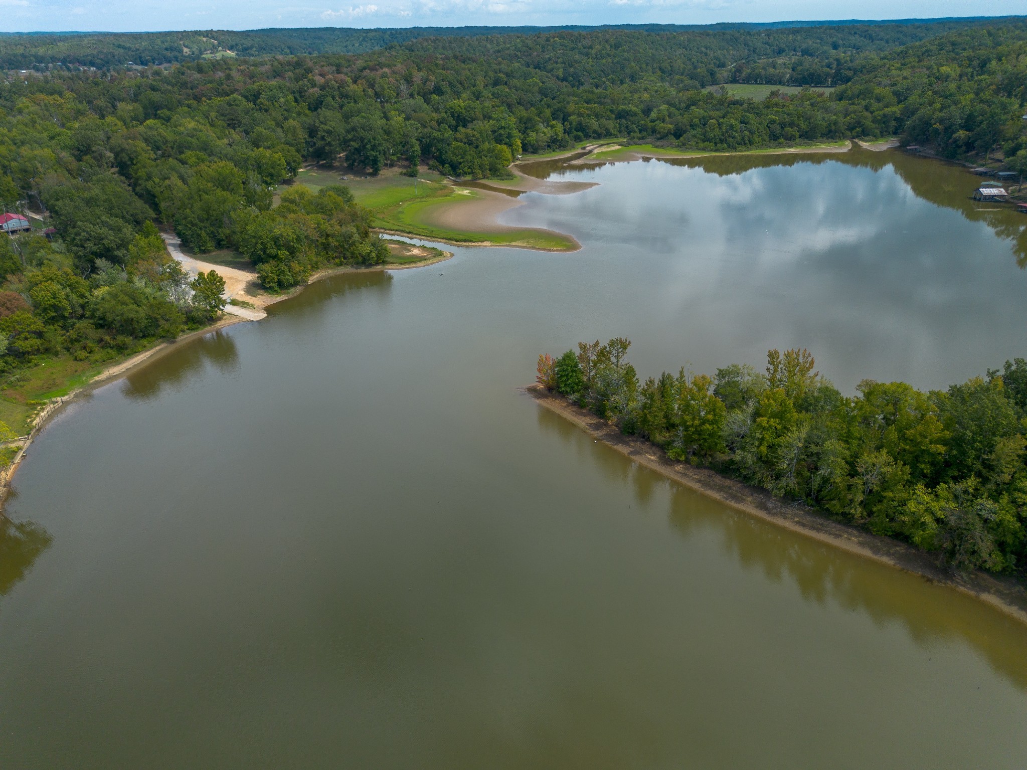 4428 Deer Creek Road Linden, TN 37096 - Photo 67 of 70 an aerial view of ocean with residential house and outdoor space