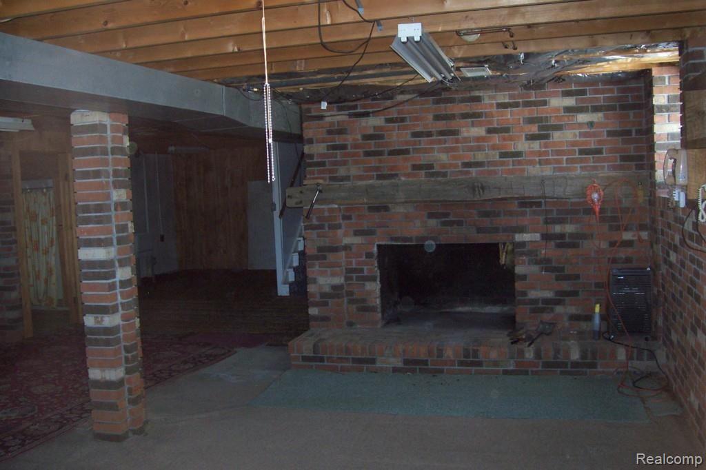 3855 Hosner Road Dryden, MI 48428 - Photo 6 of 12 Family Room Fireplace