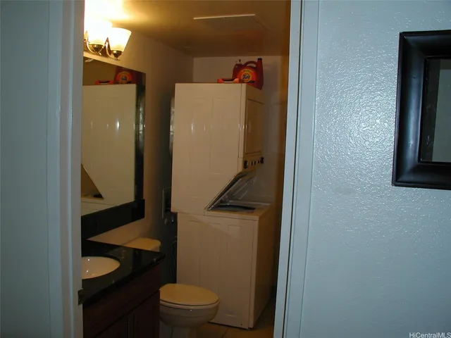 a bathroom with a toilet and a sink