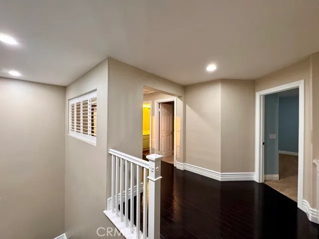 a view of livingroom and hardwood floor