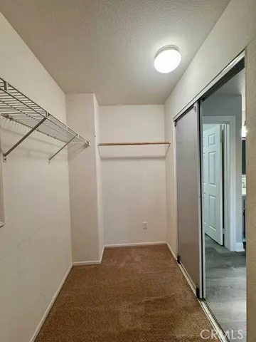 a lobby with furniture and stairs