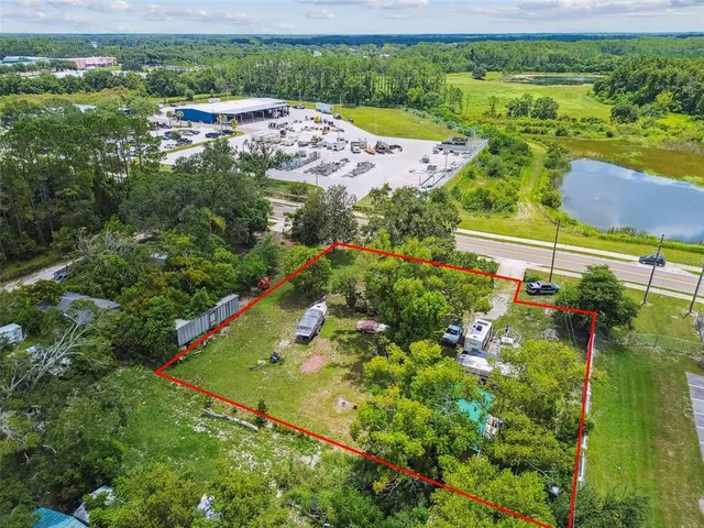 a view of a yard with an outdoor space