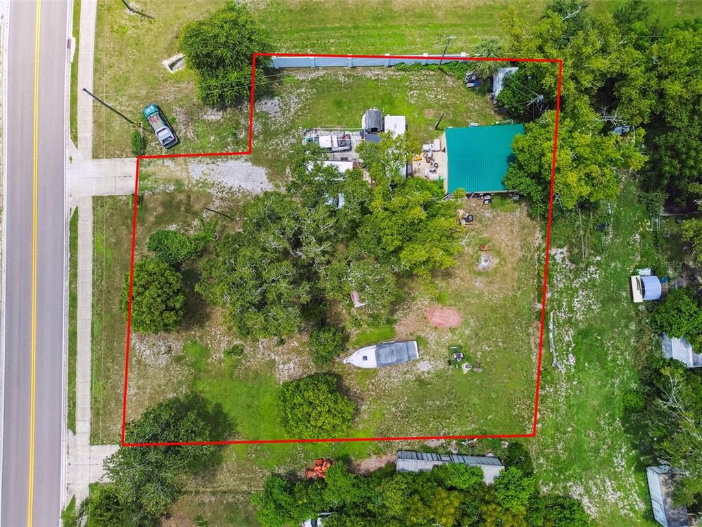 13229 Interlaken Road Odessa, FL 33556 - Photo 5 of 10 an aerial view of a house a yard and lots of green space