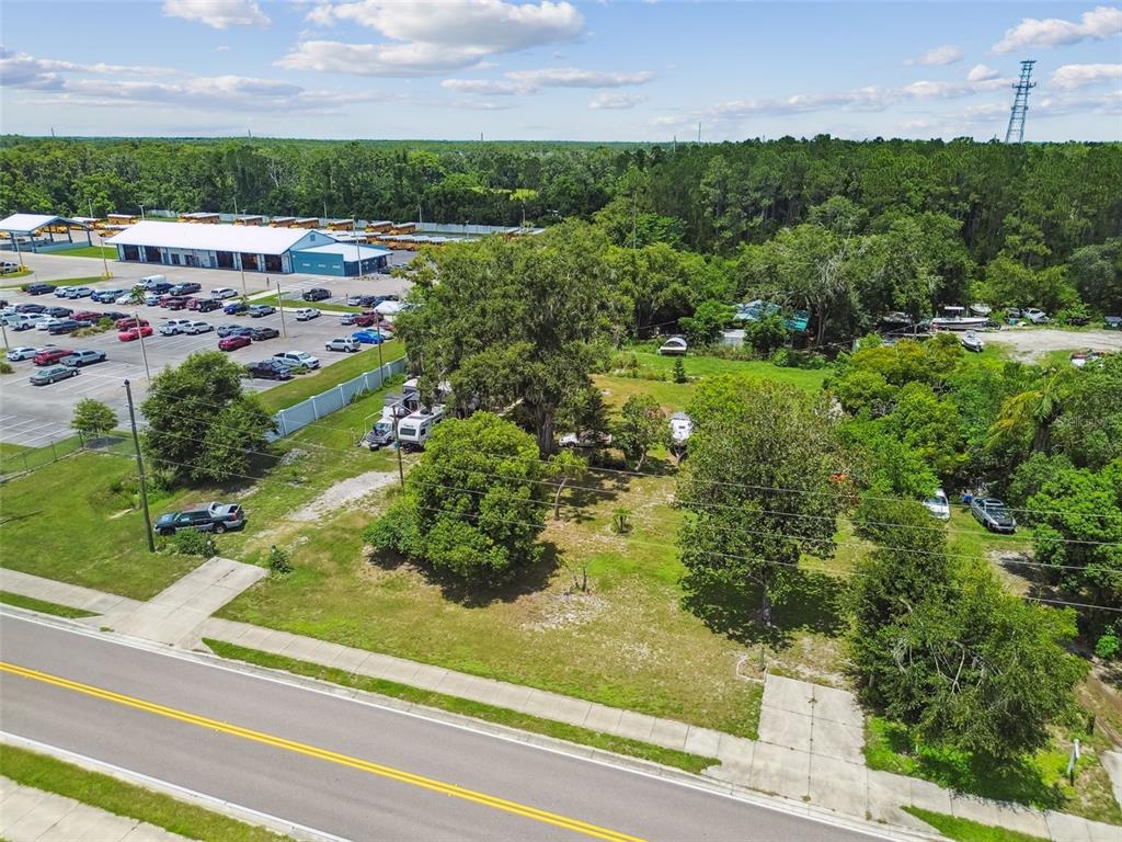 13229 Interlaken Road Odessa, FL 33556 - Photo 7 of 10 an aerial view of a houses with yard