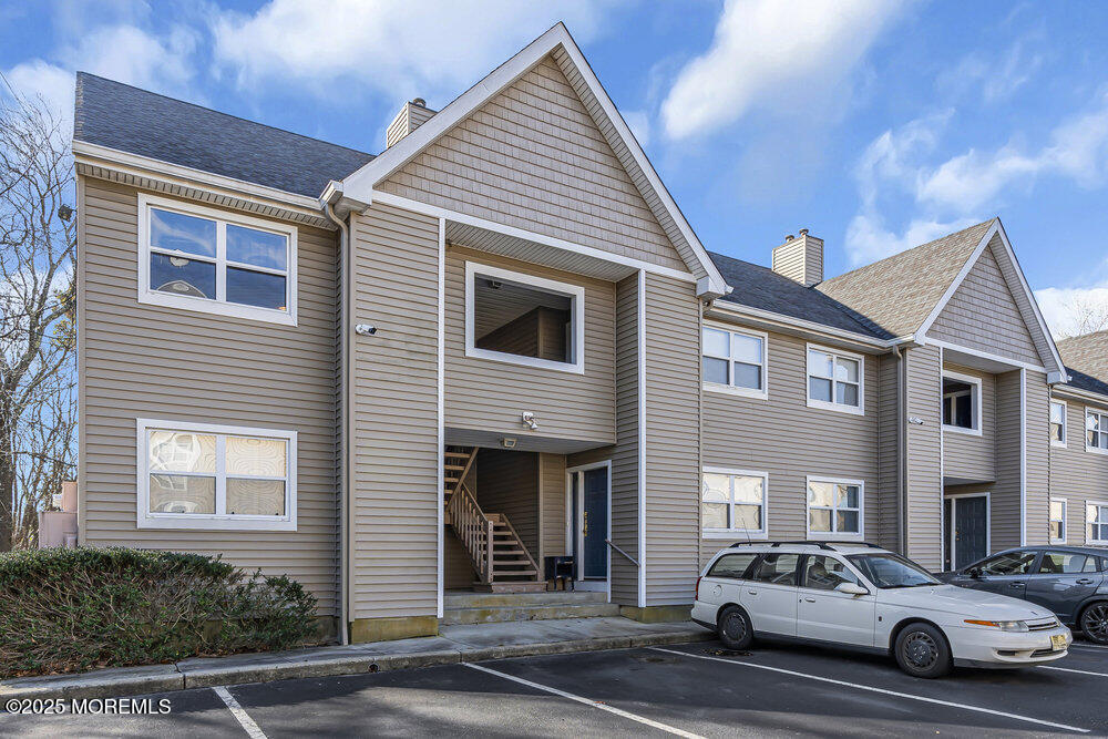 290 Highway 9, Unit B10 Barnegat, NJ 08005 - Photo 1 of 5 a view of a car park in front of house