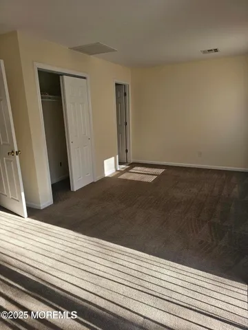 a view of a livingroom with wooden floor