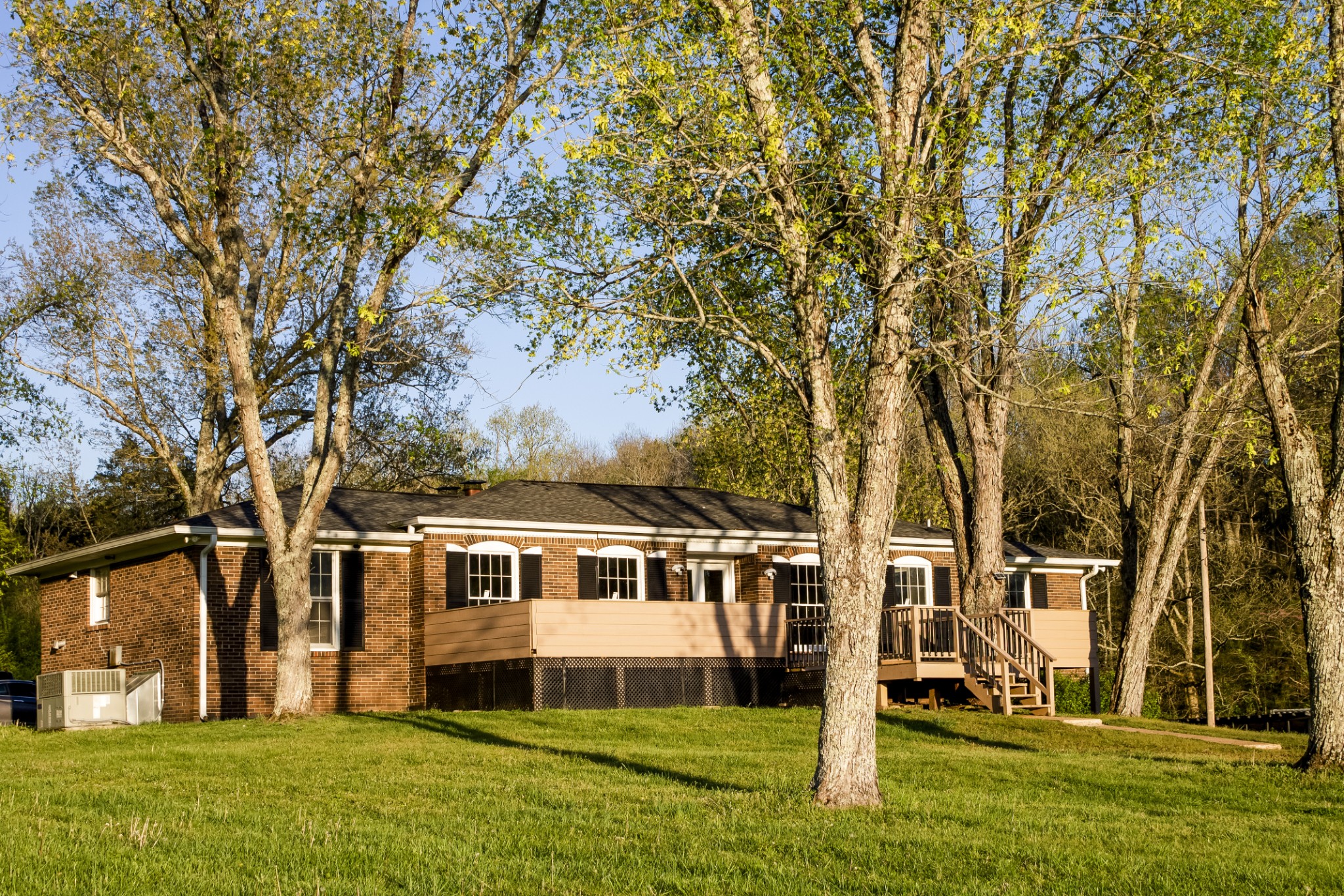 5820 Cane Ridge Road Antioch, TN 37013 - Photo 1 of 30 a front view of a house with a yard
