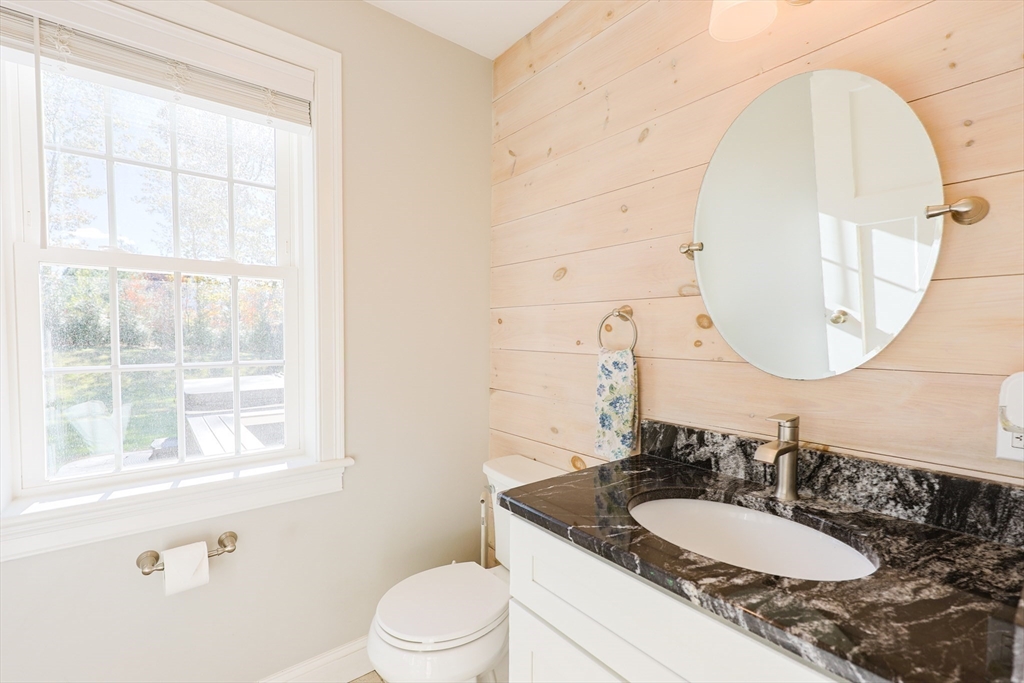 175 A Glenwood Road Rutland, MA 01543 - Photo 11 of 41 a bathroom with a granite countertop sink and a mirror