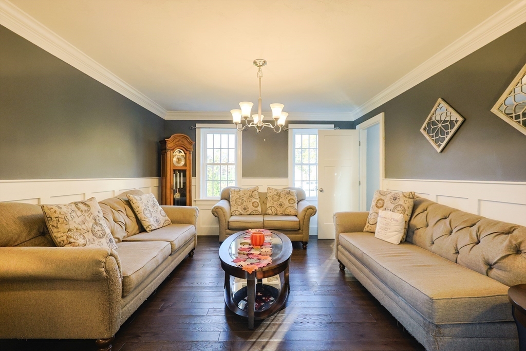 175 A Glenwood Road Rutland, MA 01543 - Photo 12 of 41 a living room with furniture and a chandelier