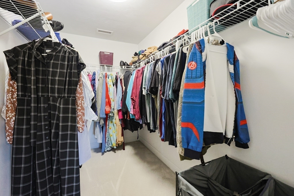 175 A Glenwood Road Rutland, MA 01543 - Photo 16 of 41 a view of walk in closet with clothes and shoes