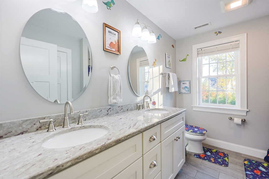 175 A Glenwood Road Rutland, MA 01543 - Photo 21 of 41 a bathroom with a granite countertop double vanity sink mirror and next to a window