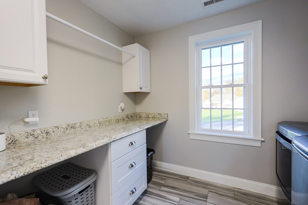 175 A Glenwood Road Rutland, MA 01543 - Photo 22 of 41 a room with granite countertop cabinets appliances and a window
