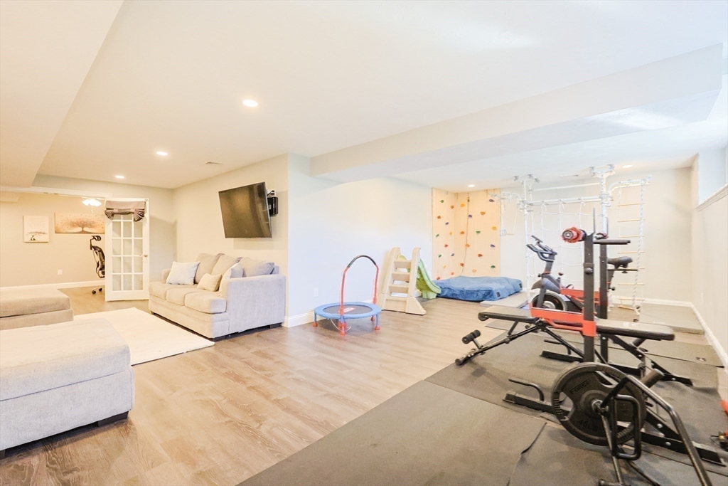 175 A Glenwood Road Rutland, MA 01543 - Photo 27 of 41 a bedroom with furniture and a gym equipment