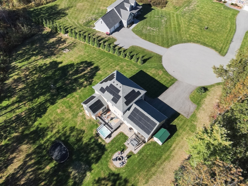 175 A Glenwood Road Rutland, MA 01543 - Photo 37 of 41 an aerial view of a house with a yard and garden