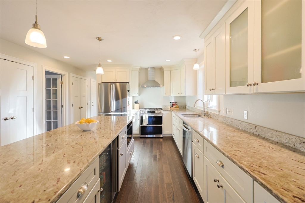 175 A Glenwood Road Rutland, MA 01543 - Photo 5 of 41 a large kitchen with stainless steel appliances granite countertop a lot of counter space and wooden floors