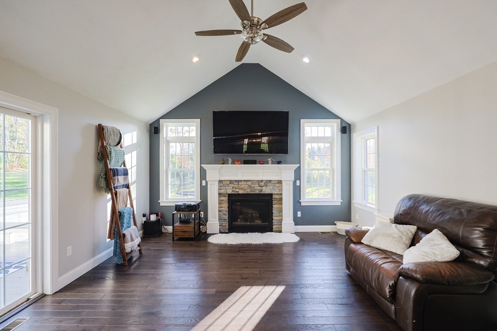 175 A Glenwood Road Rutland, MA 01543 - Photo 9 of 41 a living room with furniture and a fireplace