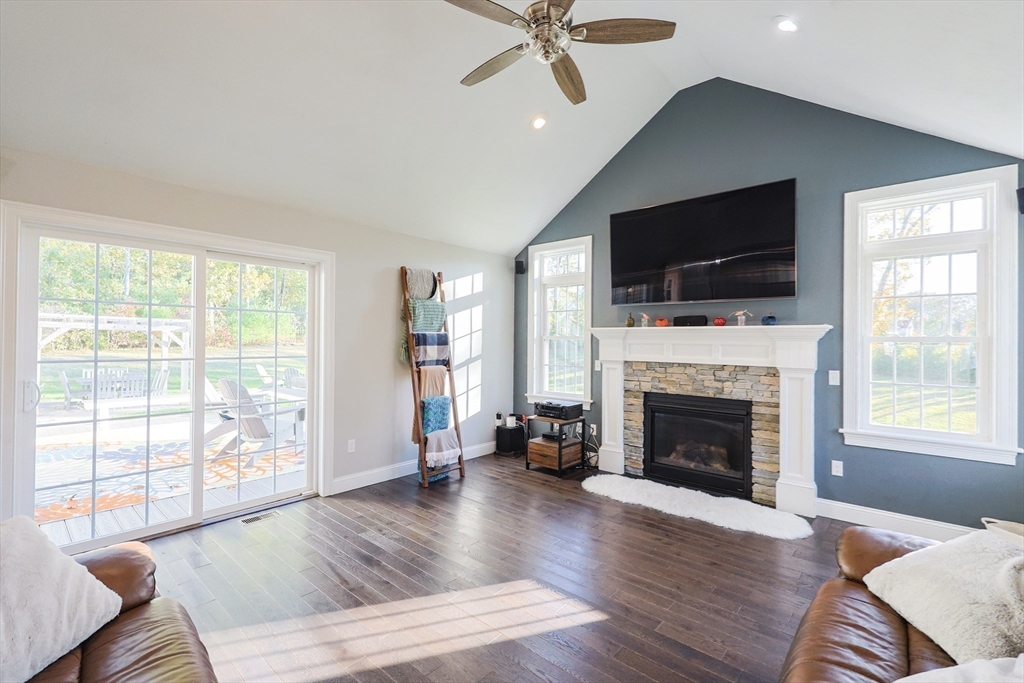 175 A Glenwood Road Rutland, MA 01543 - Photo 10 of 41 a living room with furniture fireplace and flat screen tv
