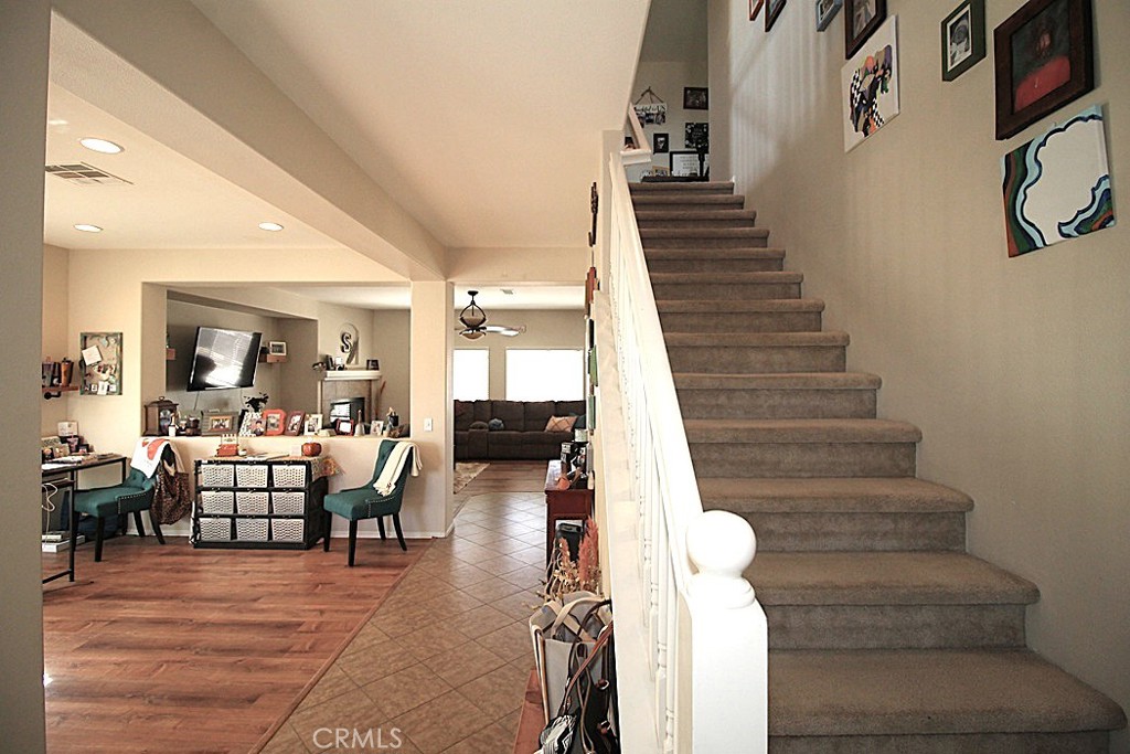 924 Condor Street Barstow, CA 92311 - Photo 21 of 52 a dining room with furniture and wooden floor