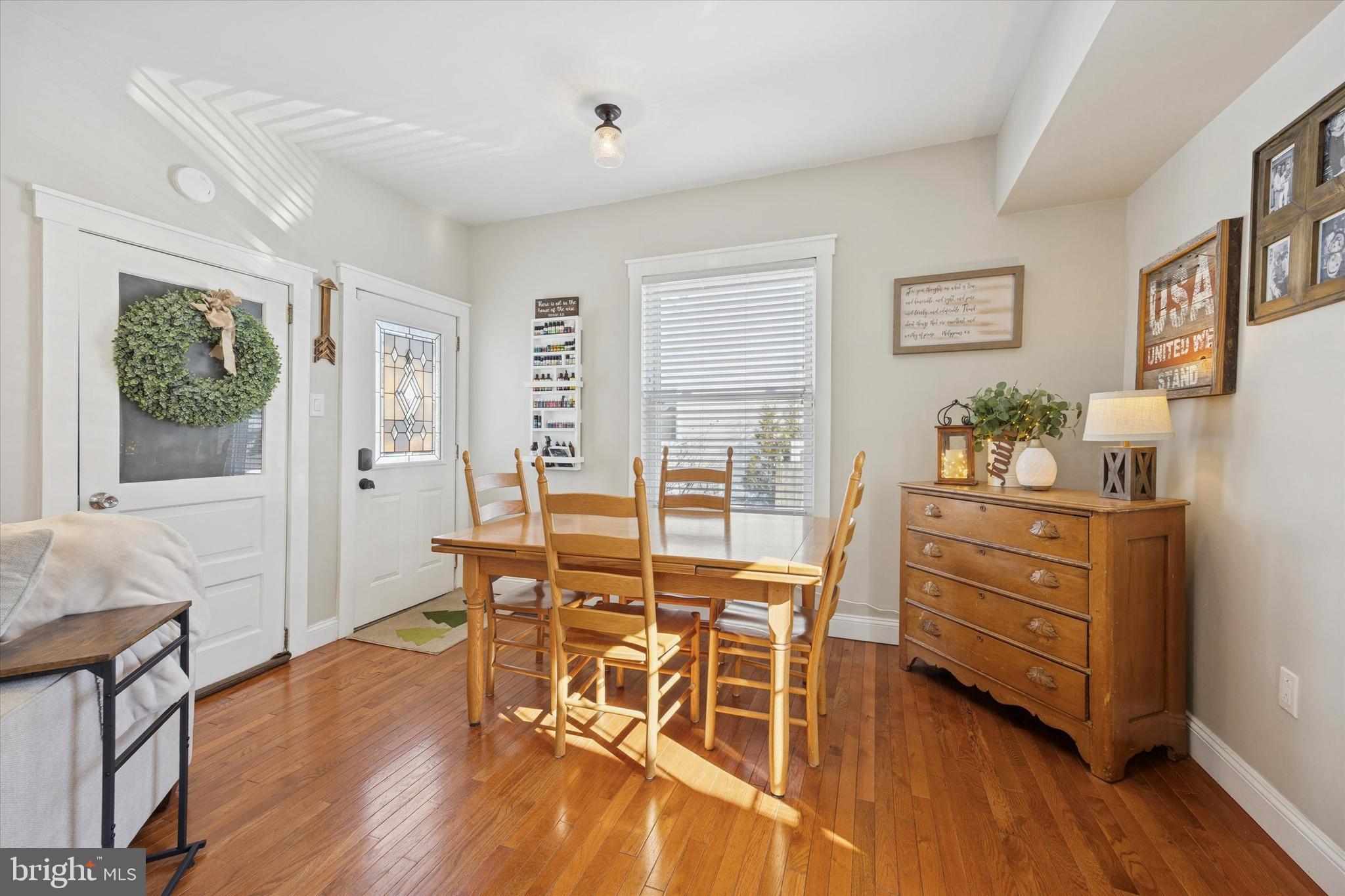 55 Kenton Avenue Pitman, NJ 08071 - Photo 12 of 26 a view of a dining room with furniture window and wooden floor