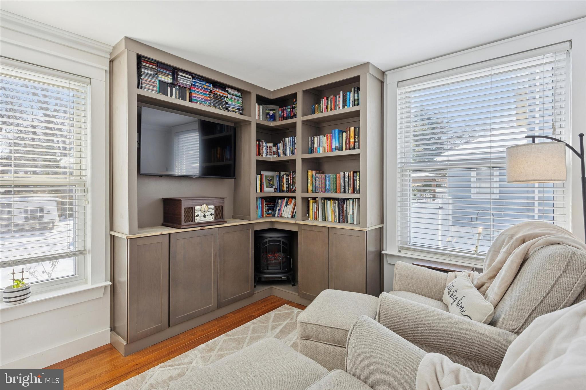 55 Kenton Avenue Pitman, NJ 08071 - Photo 13 of 26 a living room with furniture and a flat screen tv