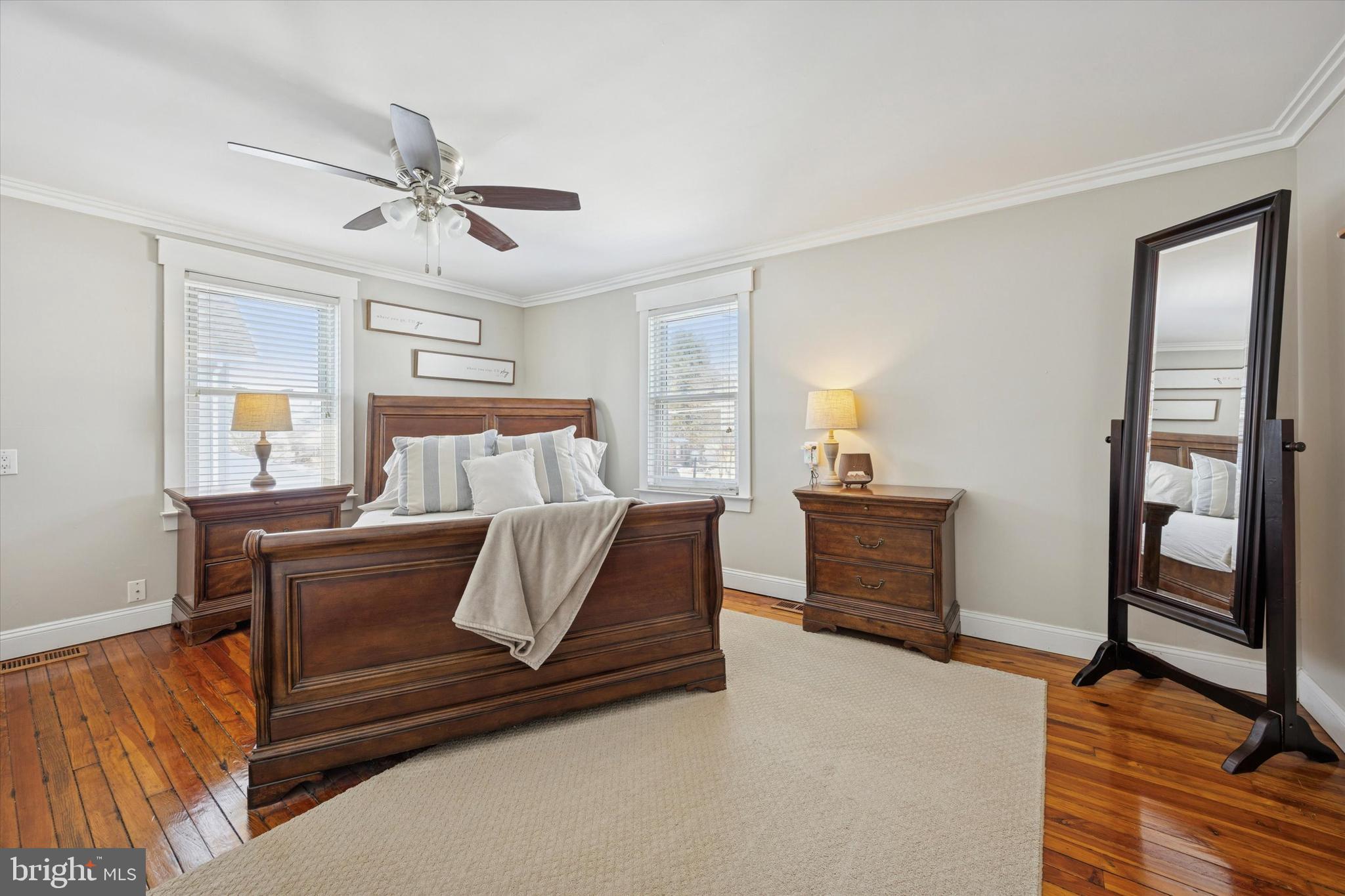 55 Kenton Avenue Pitman, NJ 08071 - Photo 16 of 26 a bedroom with furniture and wooden floor