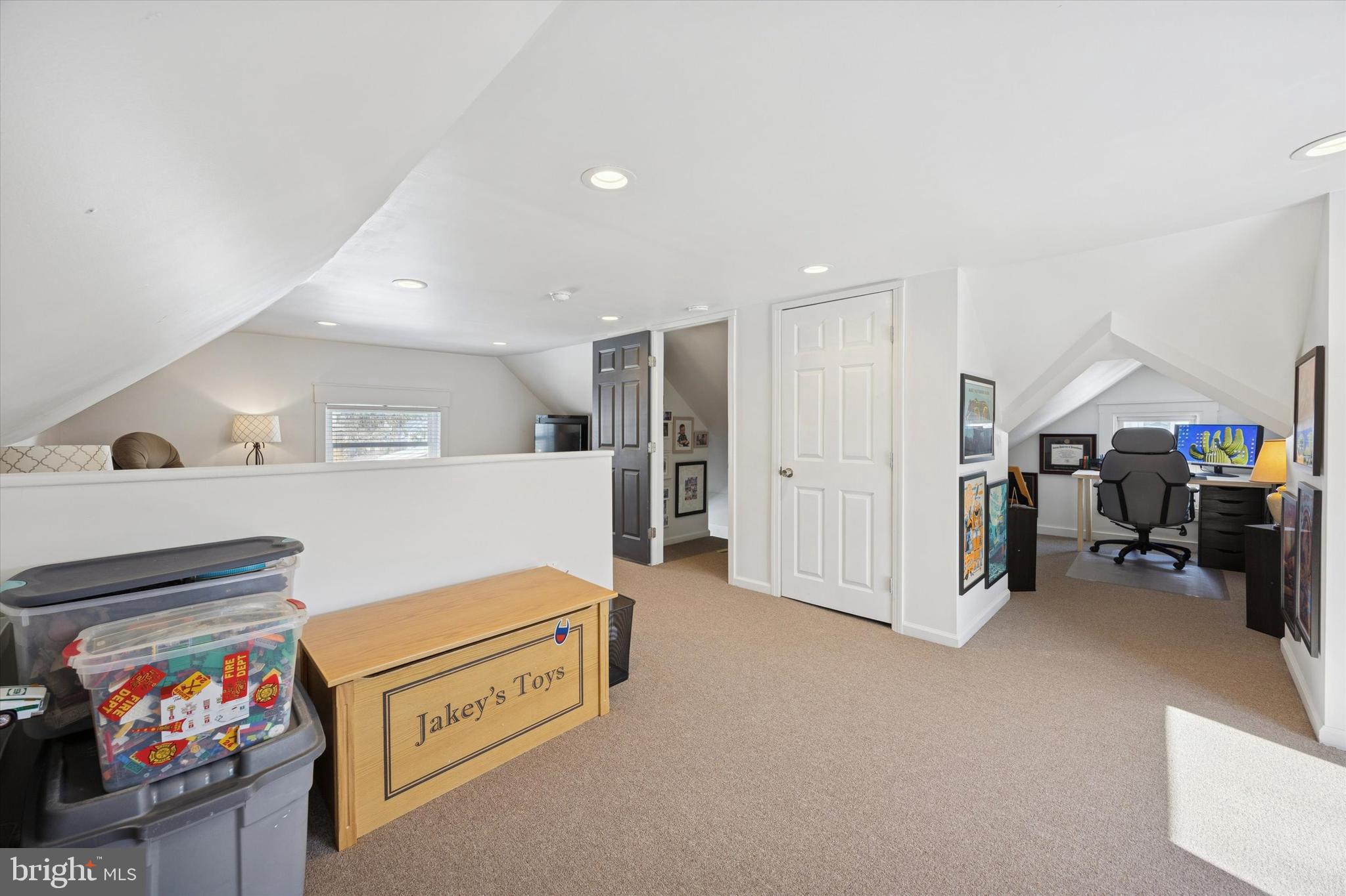 55 Kenton Avenue Pitman, NJ 08071 - Photo 23 of 26 a living room with furniture and a flat screen tv