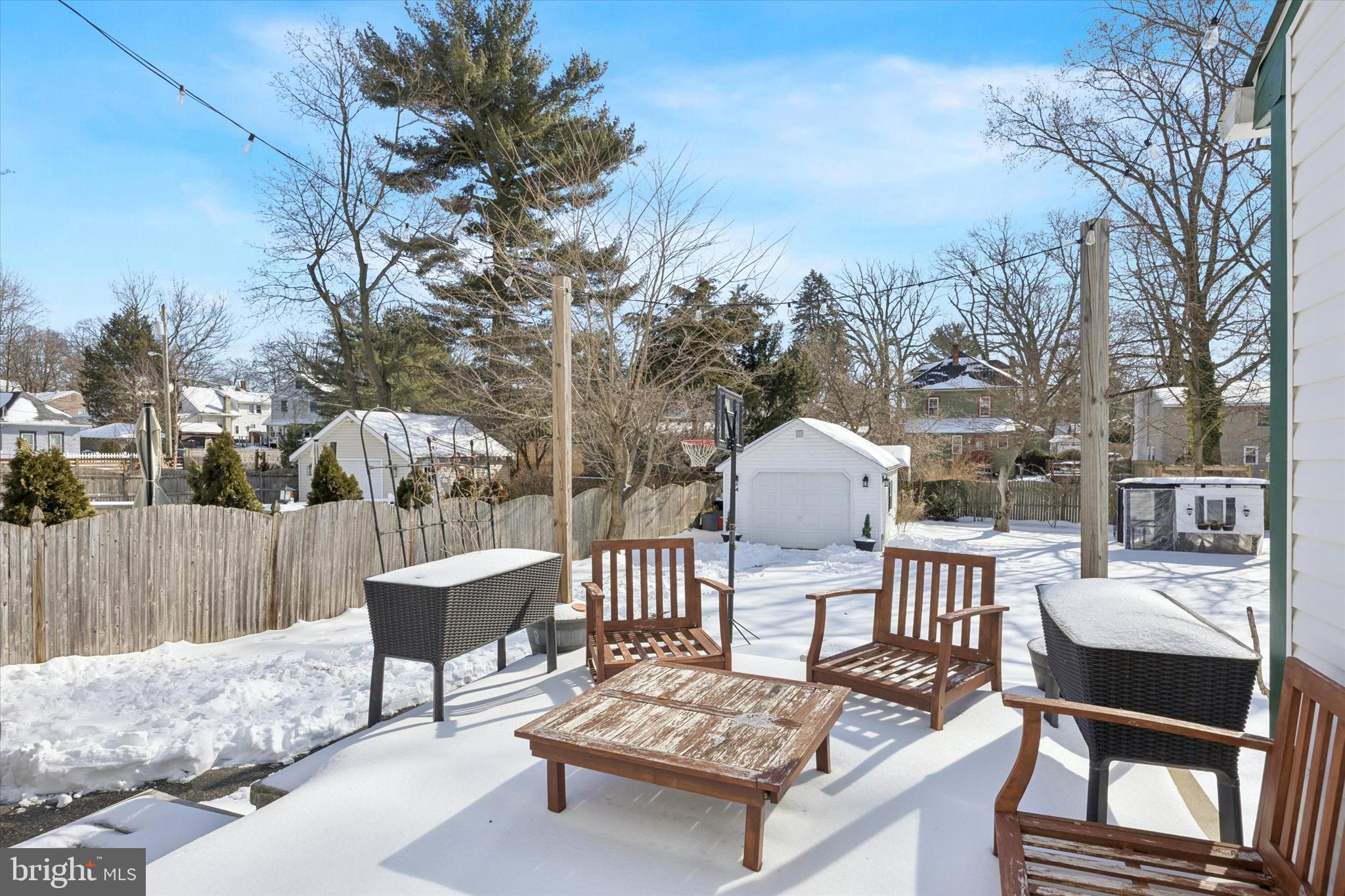 55 Kenton Avenue Pitman, NJ 08071 - Photo 24 of 26 a view of a patio with a table and chairs