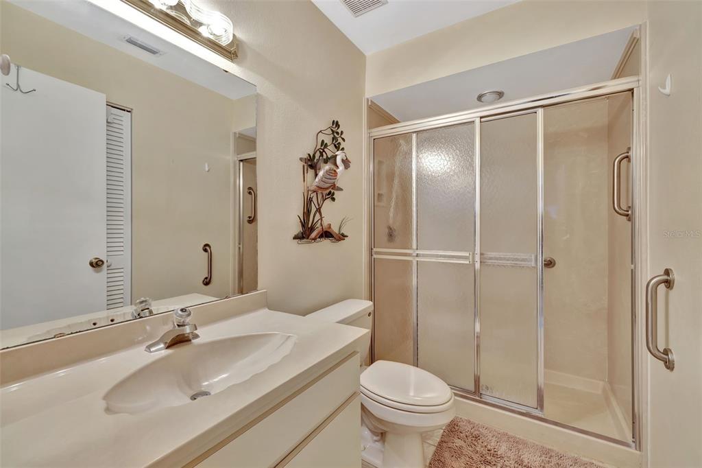 5248 Marsh Field Road, Unit 2 Sarasota, FL 34235 - Photo 15 of 30 a bathroom with a sink and a mirror