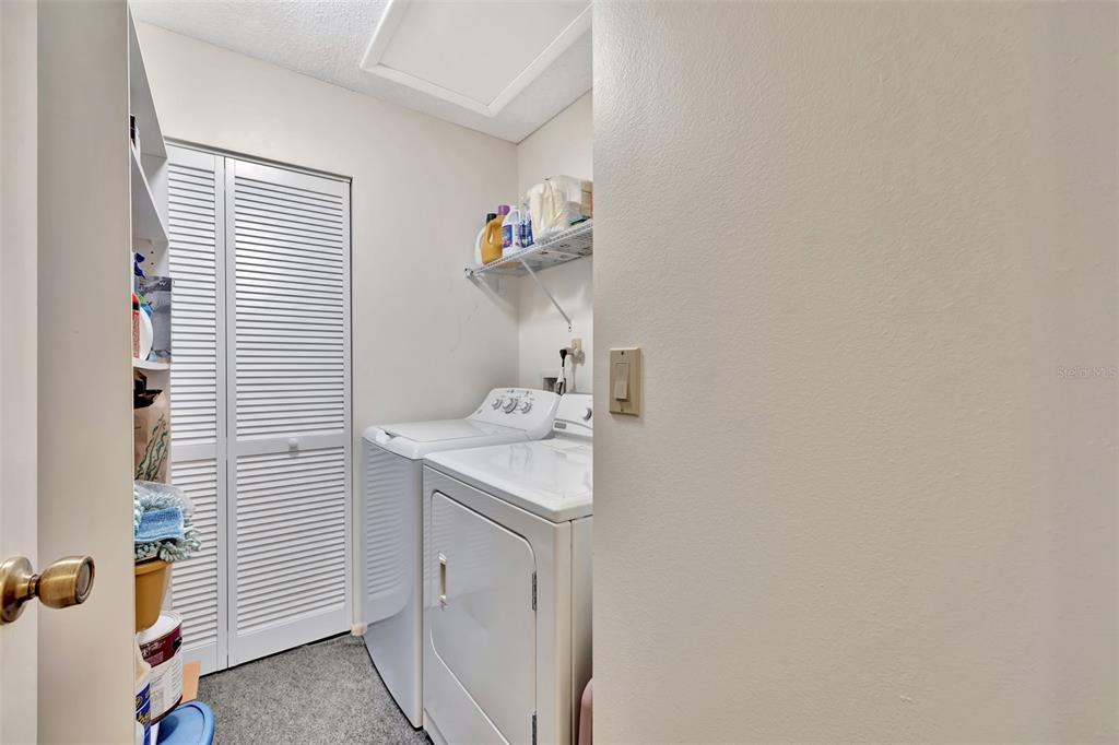 5248 Marsh Field Road, Unit 2 Sarasota, FL 34235 - Photo 25 of 30 a bathroom with a sink and a mirror