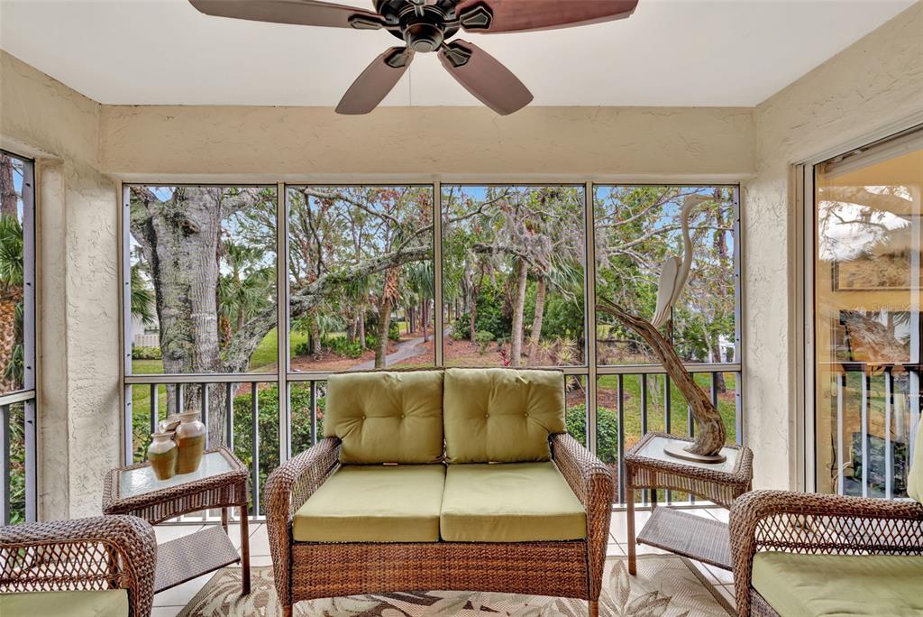 5248 Marsh Field Road, Unit 2 Sarasota, FL 34235 - Photo 26 of 30 a balcony with furniture and a potted plant