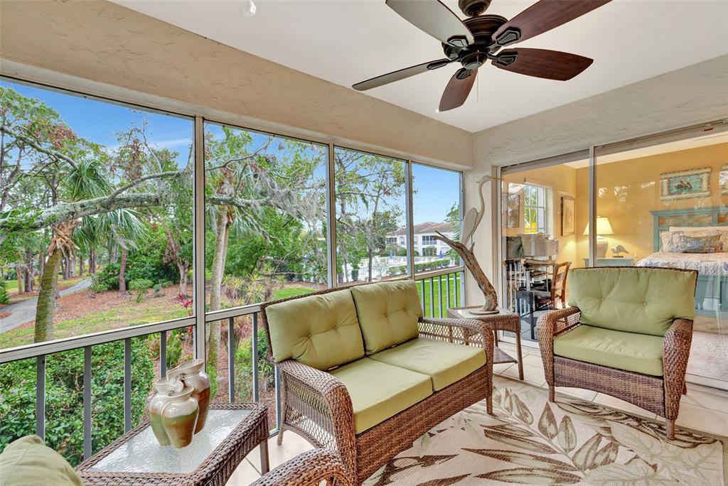 5248 Marsh Field Road, Unit 2 Sarasota, FL 34235 - Photo 28 of 30 a living room with furniture and a large window