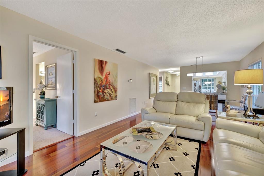 5248 Marsh Field Road, Unit 2 Sarasota, FL 34235 - Photo 10 of 30 a living room with furniture and a flat screen tv