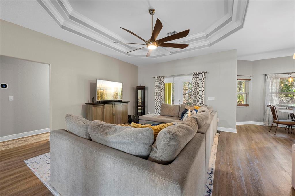 8104 Nightingale Road Weeki Wachee, FL 34613 - Photo 11 of 45 a bed room with furniture and a window