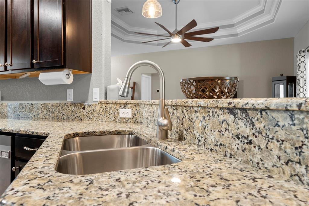 8104 Nightingale Road Weeki Wachee, FL 34613 - Photo 21 of 45 a bathroom with a sink and a mirror