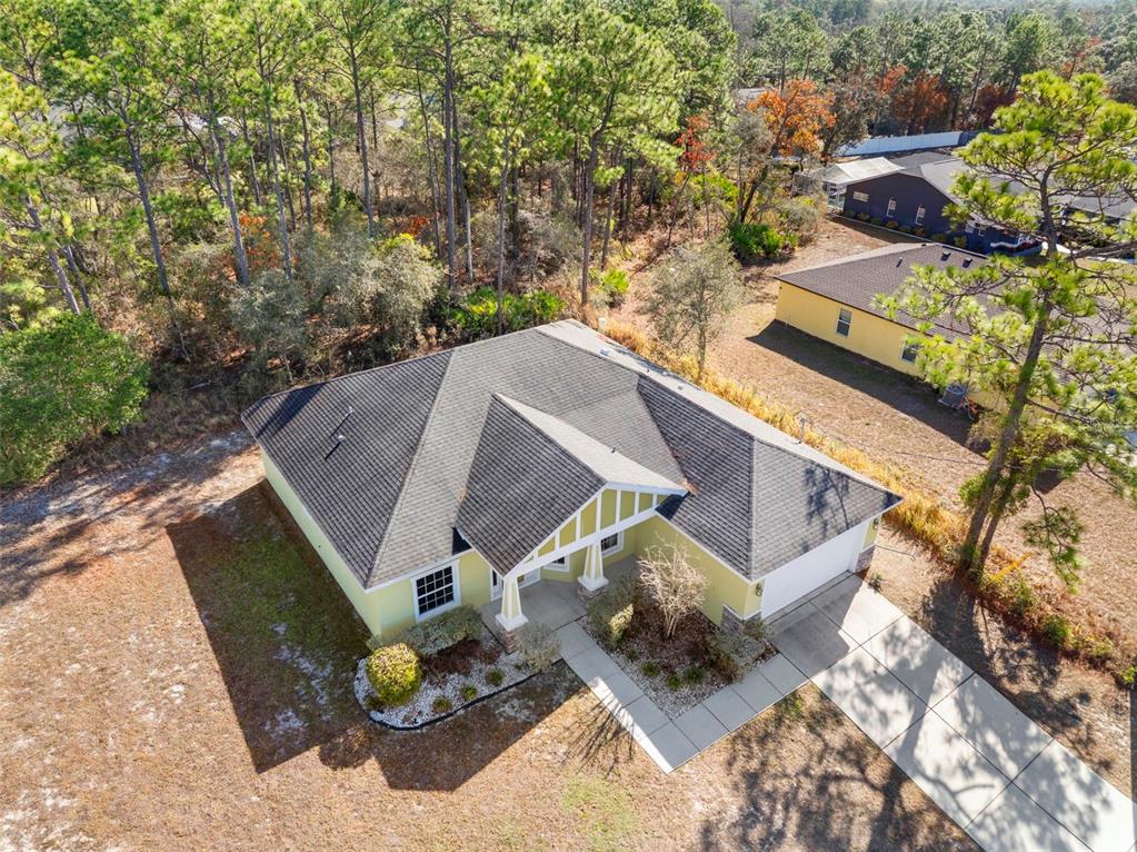 8104 Nightingale Road Weeki Wachee, FL 34613 - Photo 24 of 45 an aerial view of a house with backyard