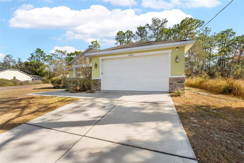8104 Nightingale Road Weeki Wachee, FL 34613 - Photo 26 of 45 a view of a house with a outdoor space