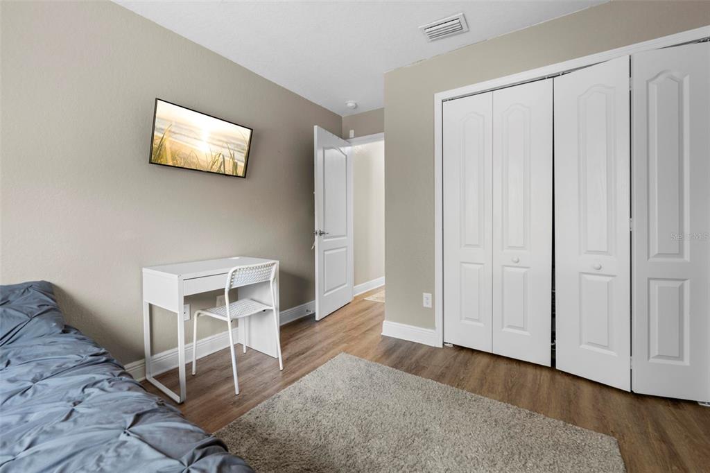 8104 Nightingale Road Weeki Wachee, FL 34613 - Photo 40 of 45 a view of a livingroom with wooden floor and a window