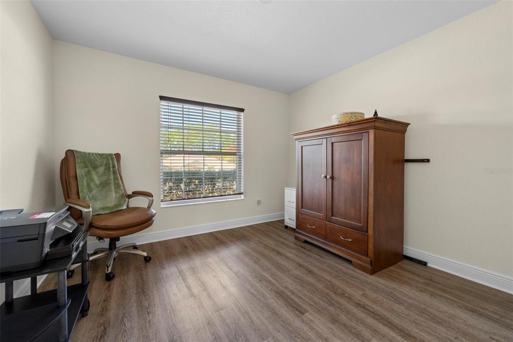 8104 Nightingale Road Weeki Wachee, FL 34613 - Photo 42 of 45 a living room with furniture and a window