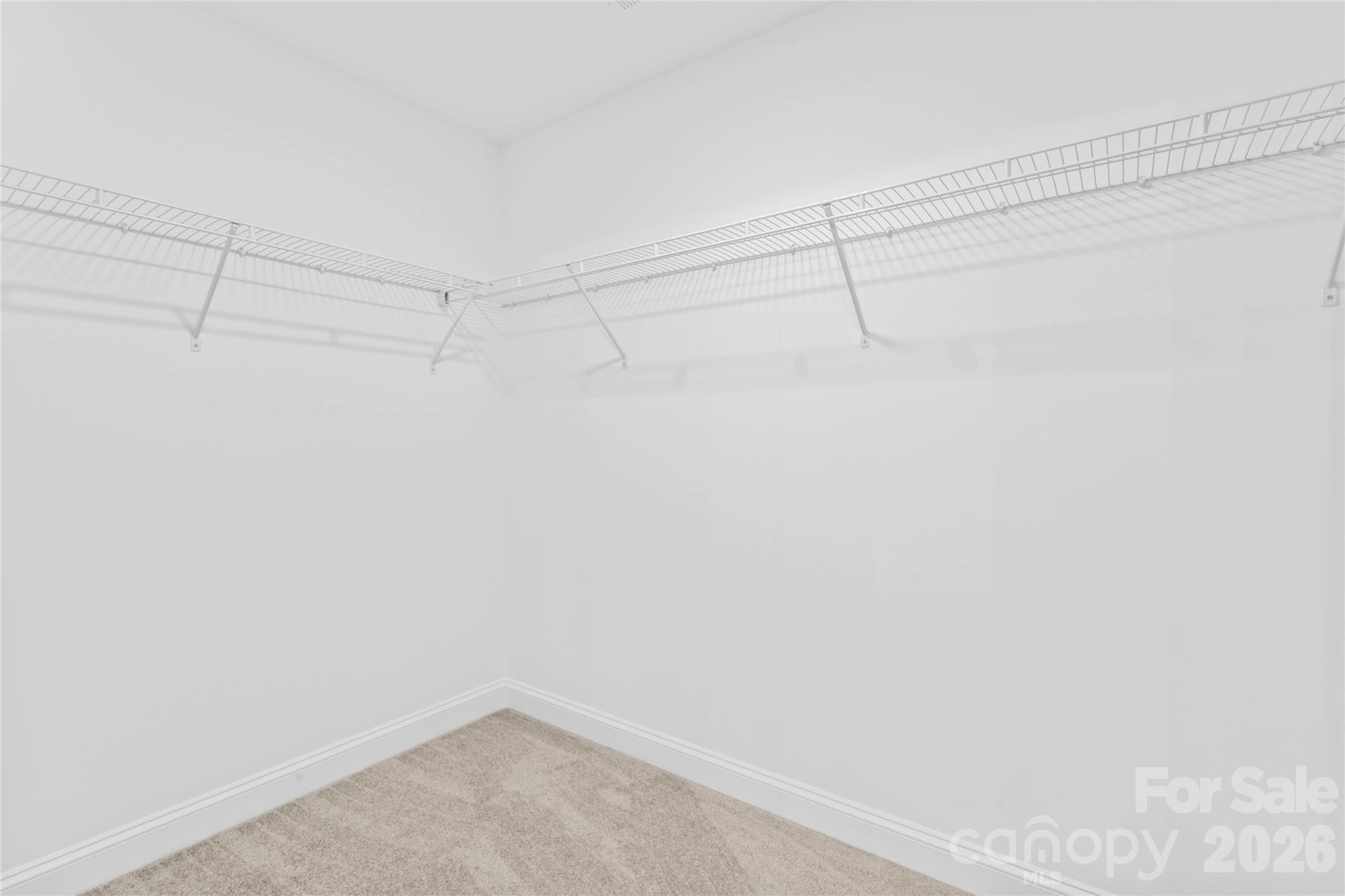 192 Doolie Road Mooresville, NC 28117 - Photo 27 of 36 a view of a room with racks on the wall