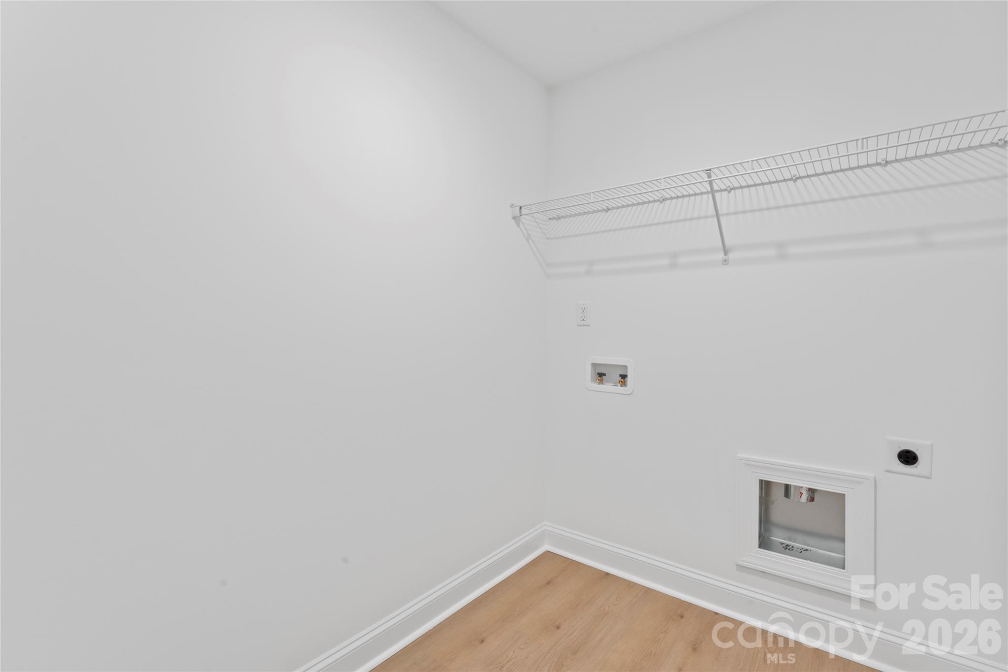 192 Doolie Road Mooresville, NC 28117 - Photo 28 of 36 a view of a room with racks on the wall