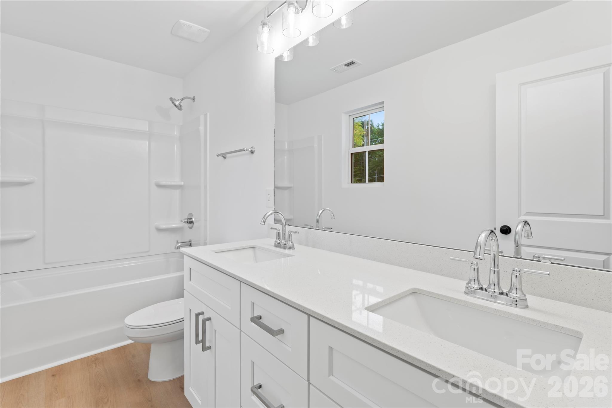 192 Doolie Road Mooresville, NC 28117 - Photo 29 of 36 a bathroom with a sink a toilet and shower