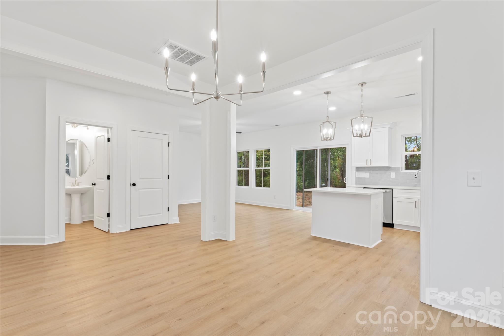 192 Doolie Road Mooresville, NC 28117 - Photo 9 of 36 a view of a house with kitchen and windows