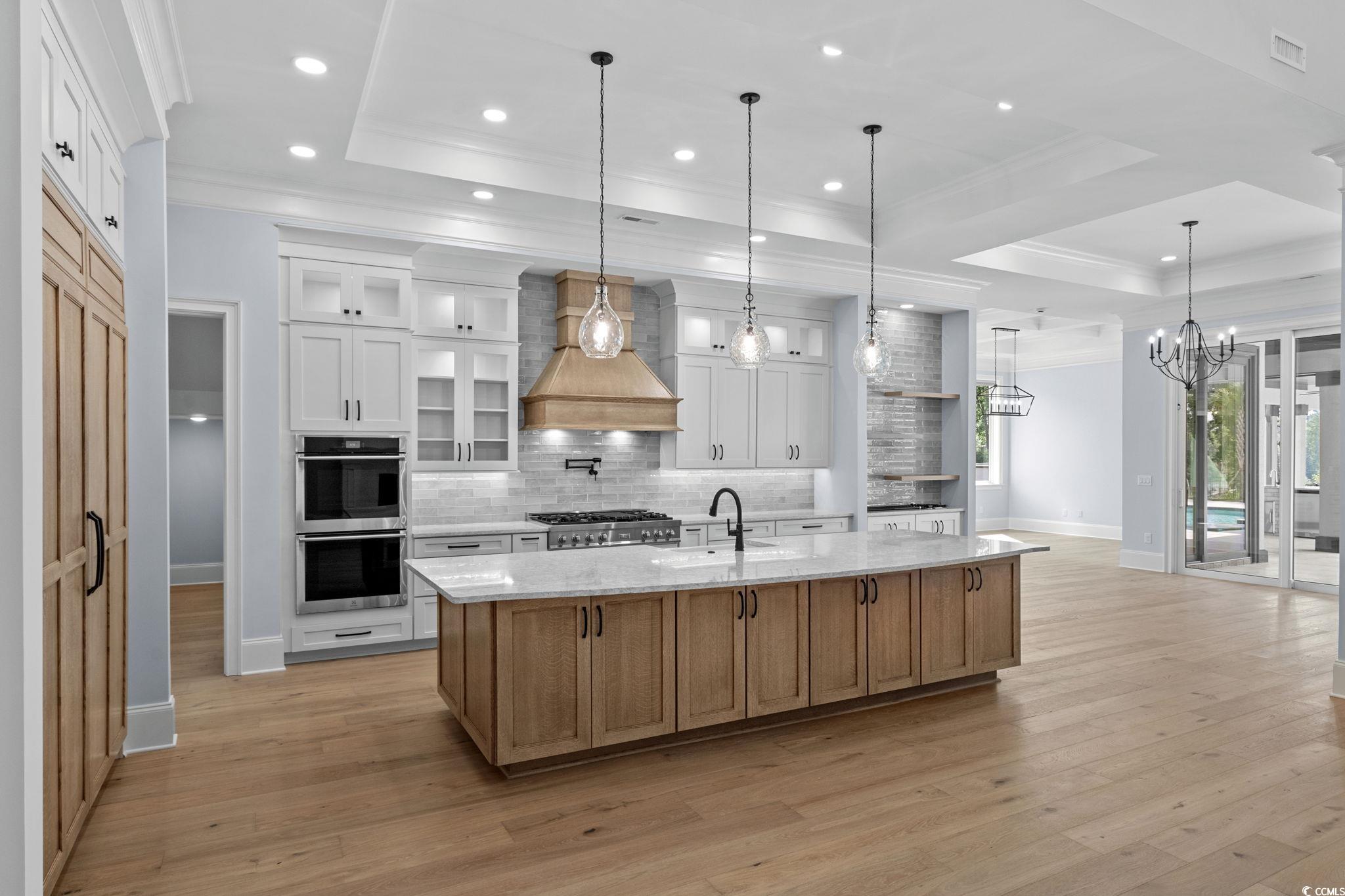372 Chamberlin Road Myrtle Beach, SC 29588 - Photo 12 of 39 Kitchen featuring a raised ceiling, custom exhaust