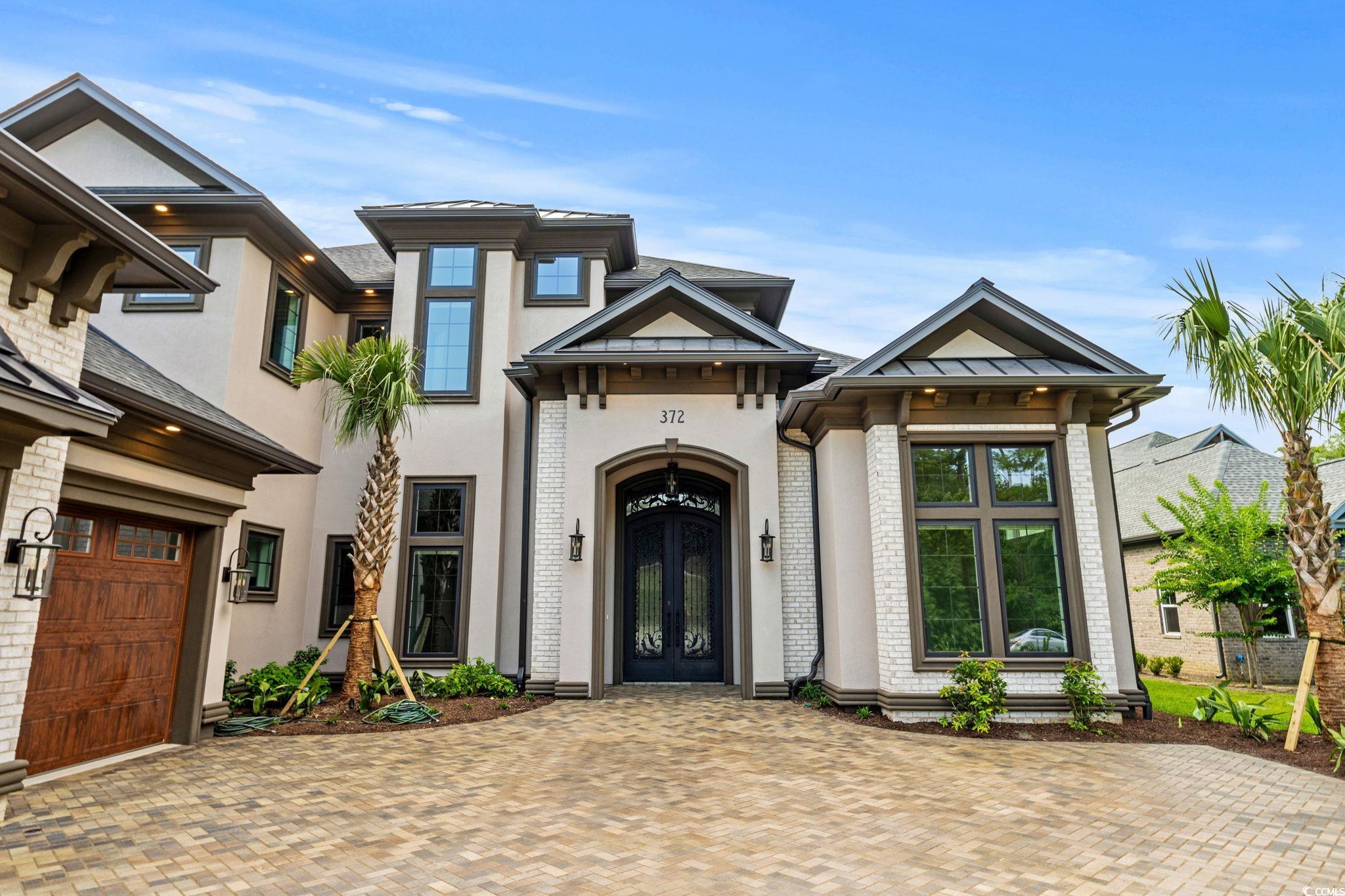 372 Chamberlin Road Myrtle Beach, SC 29588 - Photo 3 of 39 View of front facade featuring french doors, stucc