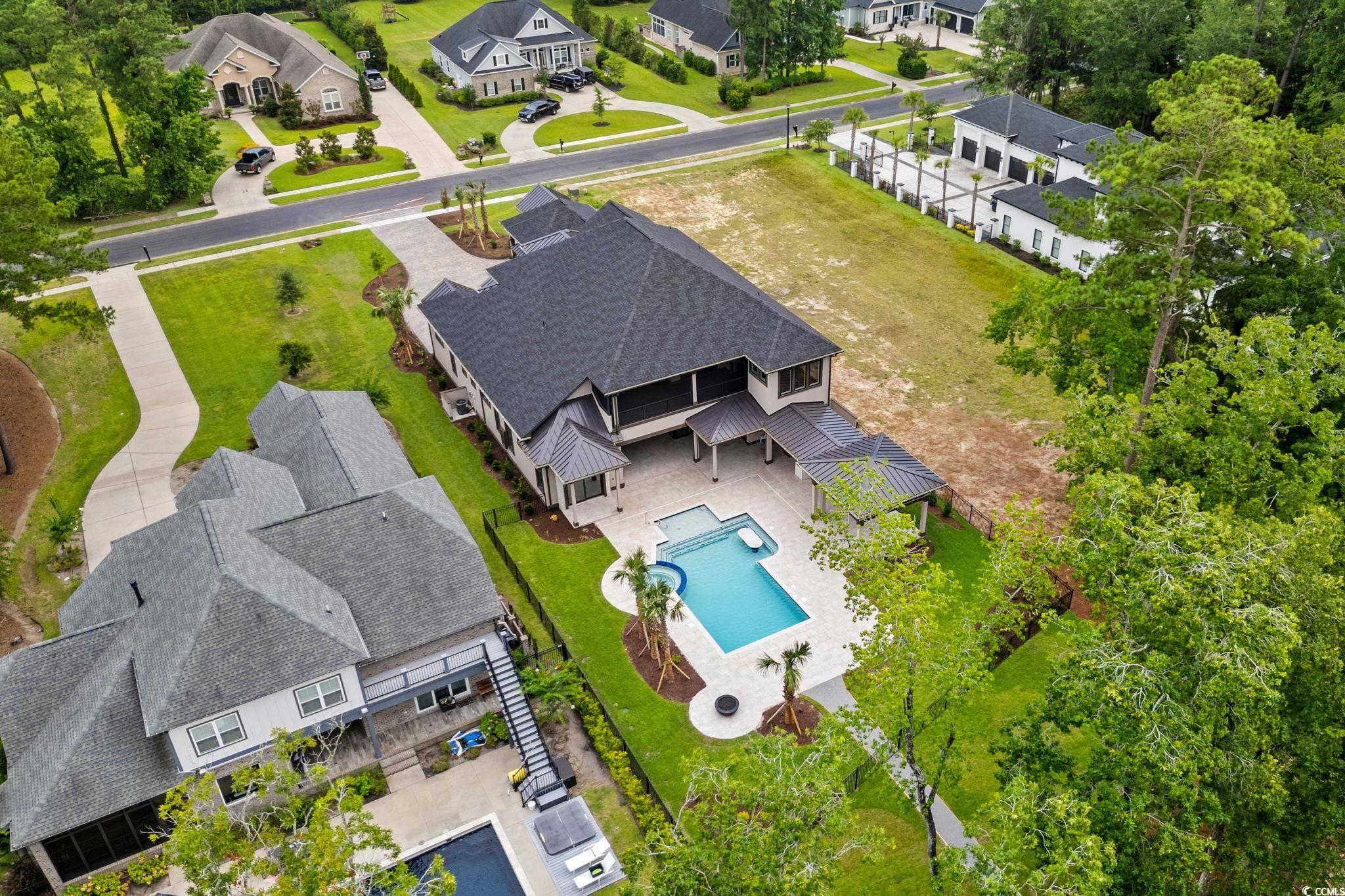 372 Chamberlin Road Myrtle Beach, SC 29588 - Photo 32 of 39 Aerial perspective of suburban area featuring a po